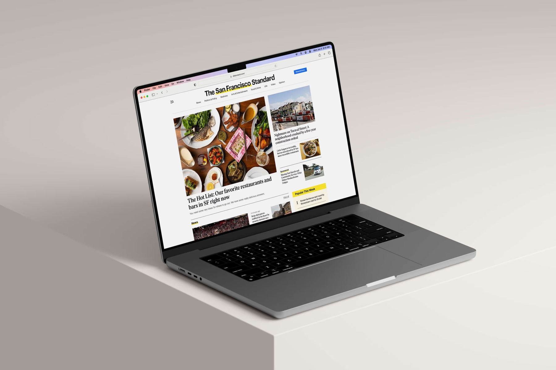 The redesigned San Francisco Standard homepage on a laptop.